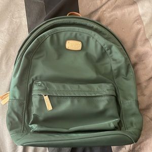 Michael Kors green backpack